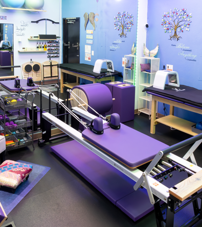Pilates reformer equipment inside ReformYou wellness studio